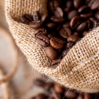 Coffee beans on a burlap sack